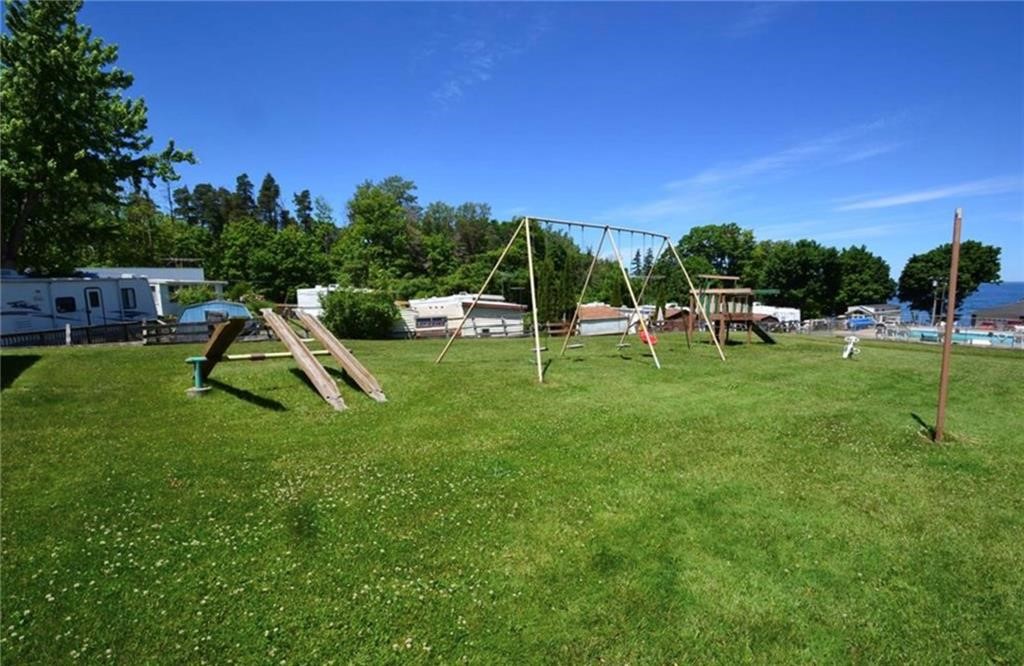 7945 Lake Road, Unit 129 Sodus, NY 14555 - Photo 6 of 22 The playground!