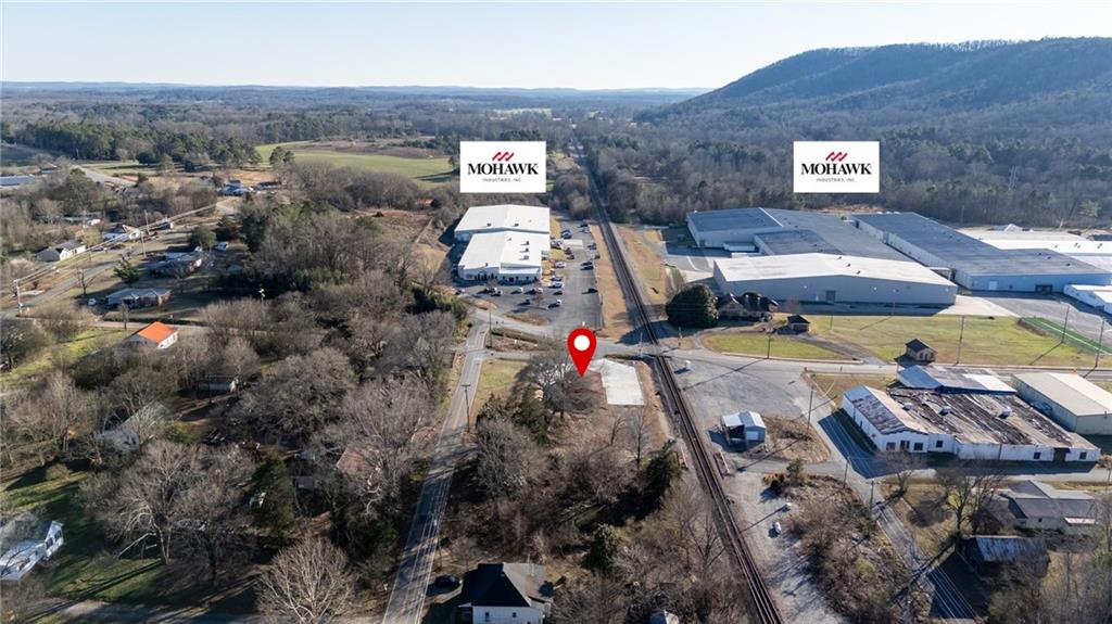 3035 Sugar Valley Road Northwest Sugar Valley, GA 30746 - Photo 12 of 18 an aerial view of a house with swimming pool and mountain view