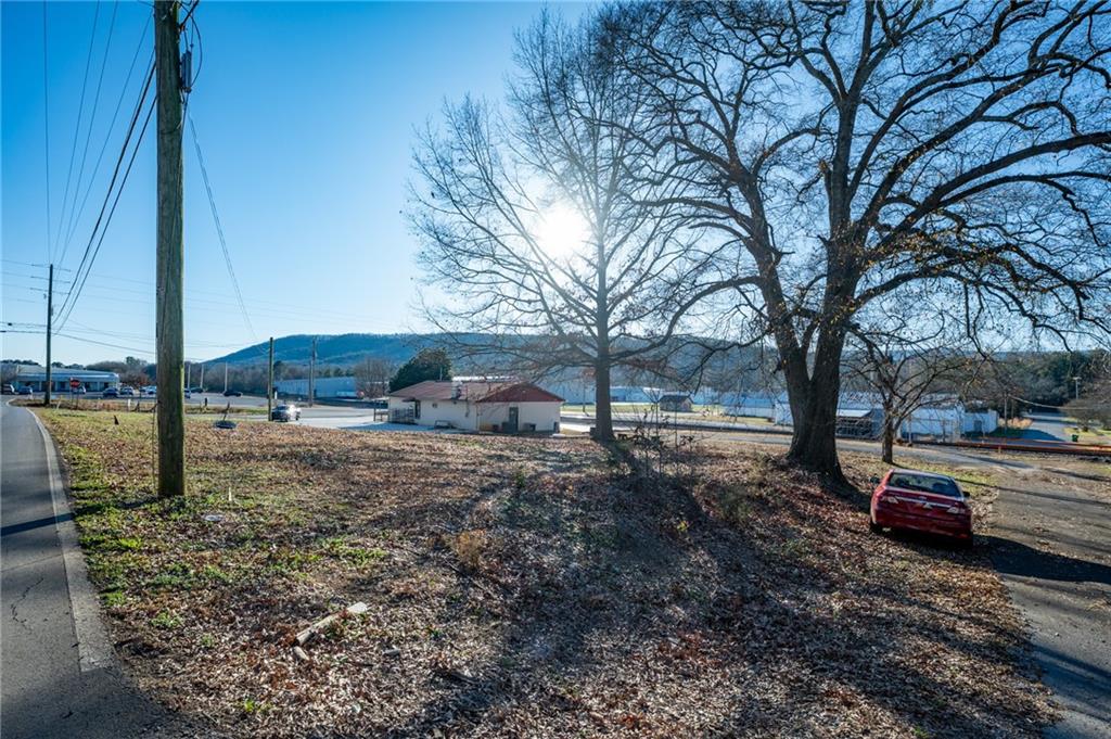 3035 Sugar Valley Road Northwest Sugar Valley, GA 30746 - Photo 17 of 18 a view of a backyard of the house