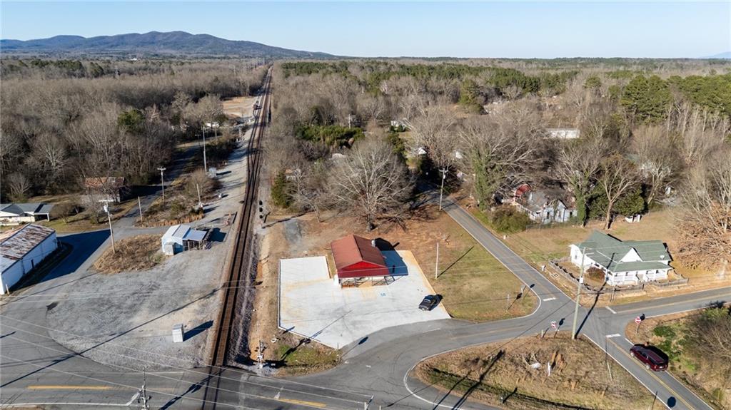 3035 Sugar Valley Road Northwest Sugar Valley, GA 30746 - Photo 7 of 18 an aerial view of residential house with outdoor space