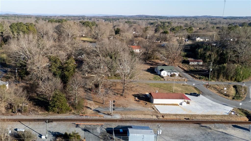 3035 Sugar Valley Road Northwest Sugar Valley, GA 30746 - Photo 9 of 18 an aerial view of residential houses with outdoor space