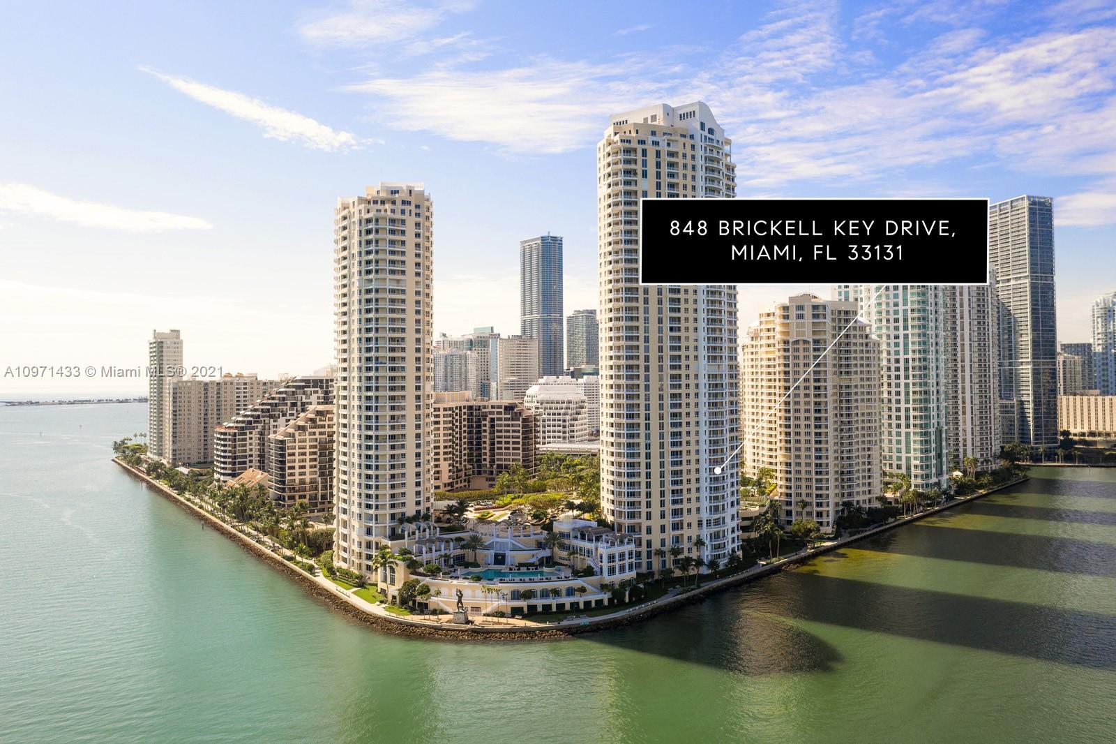 848 Brickell Key Drive, Unit 904 Miami, FL 33131 - Photo 1 of 31 a view of a city with tall buildings