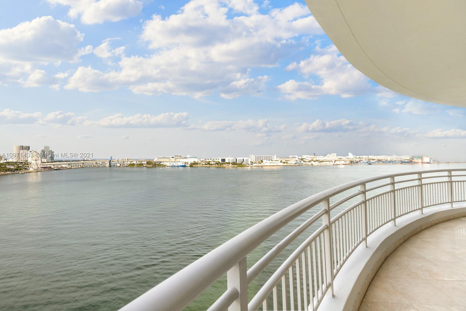 848 Brickell Key Drive, Unit 904 Miami, FL 33131 - Photo 22 of 31 a view of a lake from a balcony
