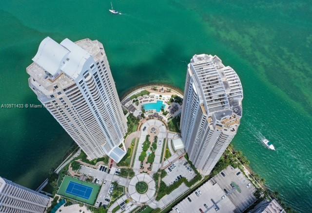 848 Brickell Key Drive, Unit 904 Miami, FL 33131 - Photo 29 of 31 a view of staircase with rug