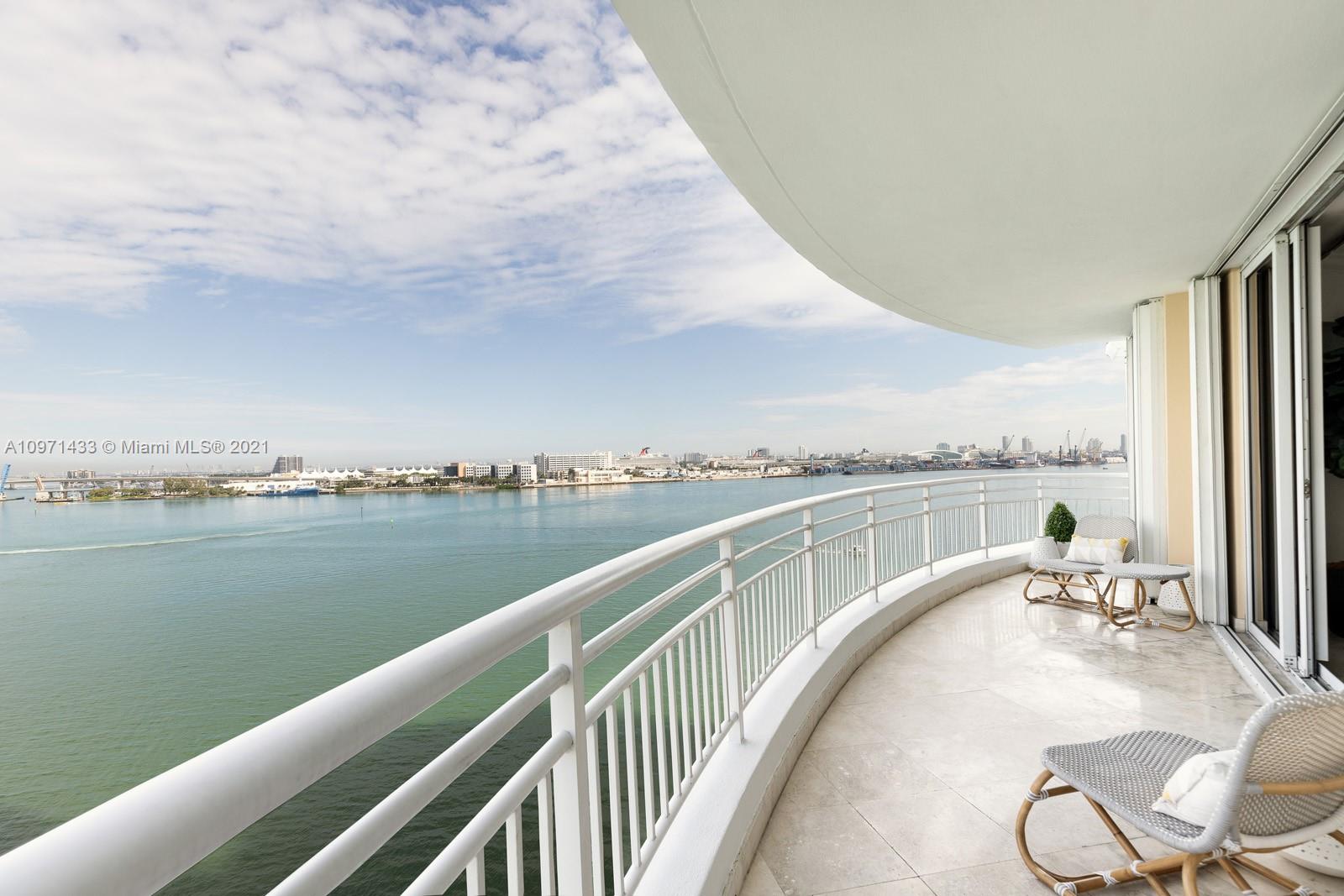 848 Brickell Key Drive, Unit 904 Miami, FL 33131 - Photo 4 of 31 a terrace with outdoor seating and lake view