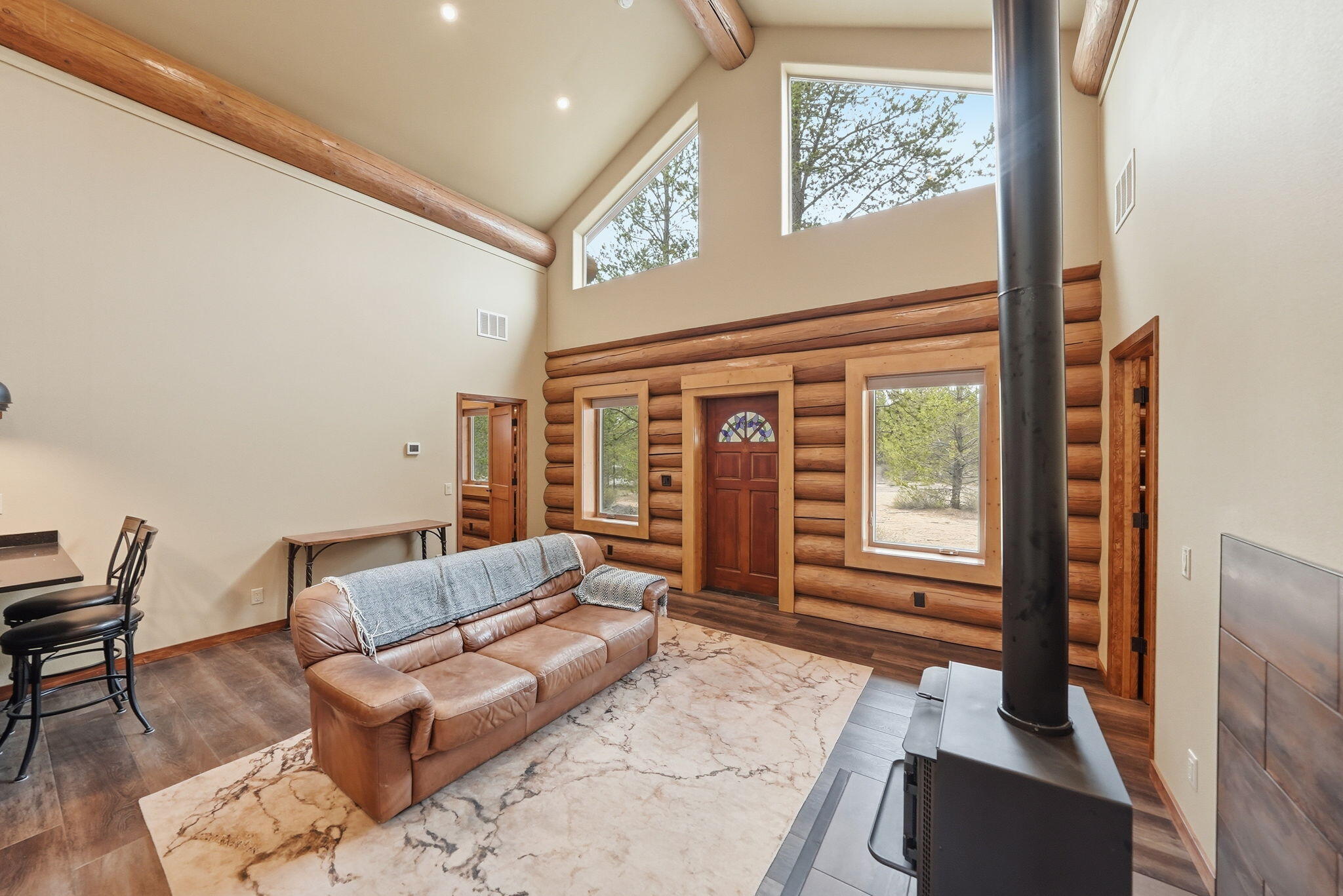 54270 Huntington Road La Pine, OR 97739 - Photo 6 of 68 a living room with furniture and a large window