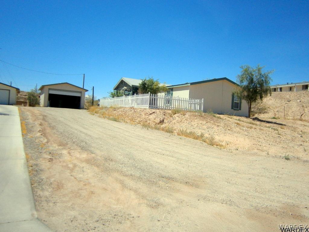 a view of backyard of a house
