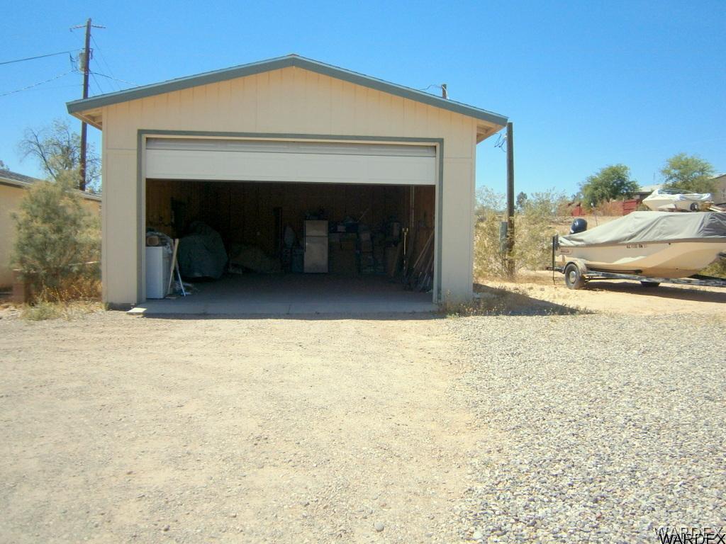 13411 South Water Reed Way, Unit 3 Topock, AZ 86436 - Photo 14 of 16 a view of an empty room with a fireplace