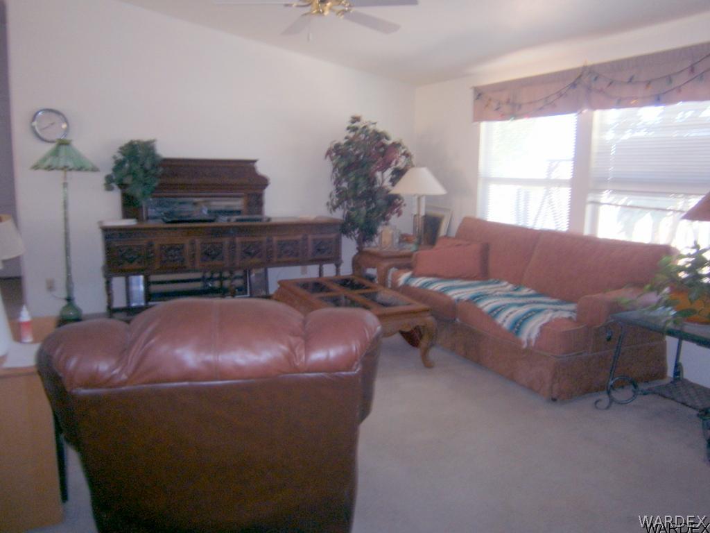 13411 South Water Reed Way, Unit 3 Topock, AZ 86436 - Photo 5 of 16 a living room with furniture and a fireplace