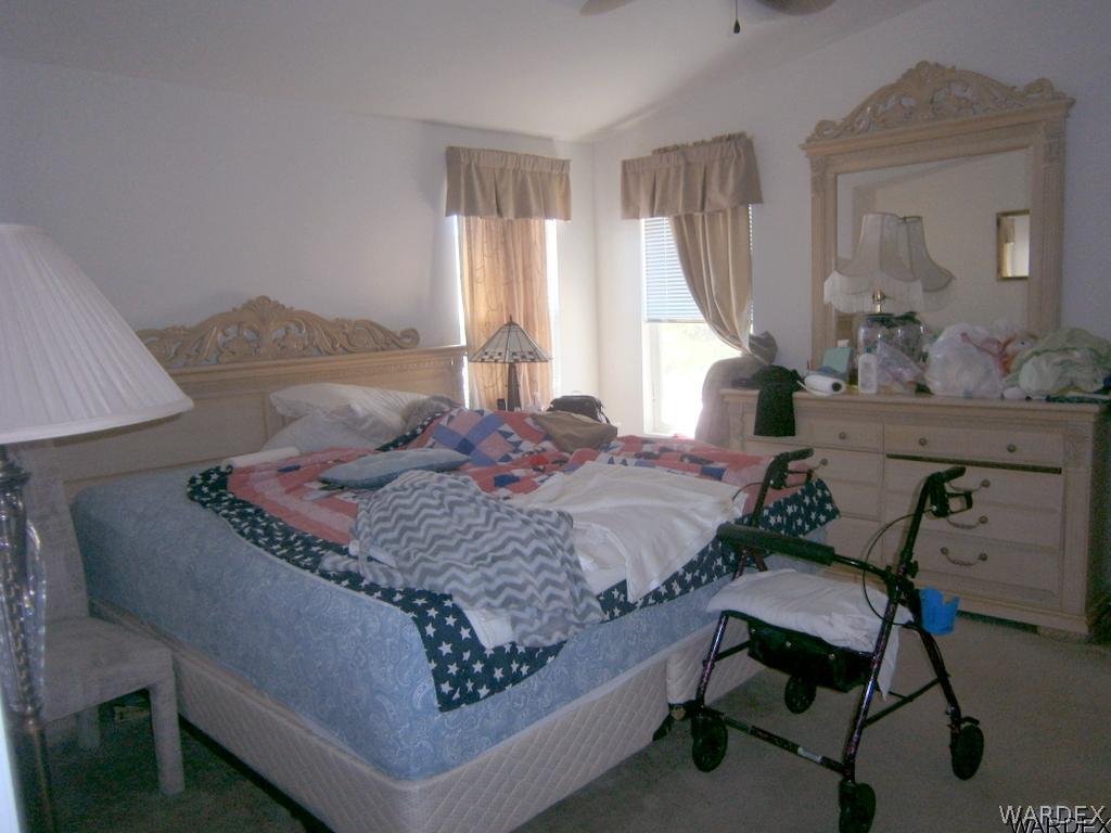 13411 South Water Reed Way, Unit 3 Topock, AZ 86436 - Photo 10 of 16 a living room with furniture and a window