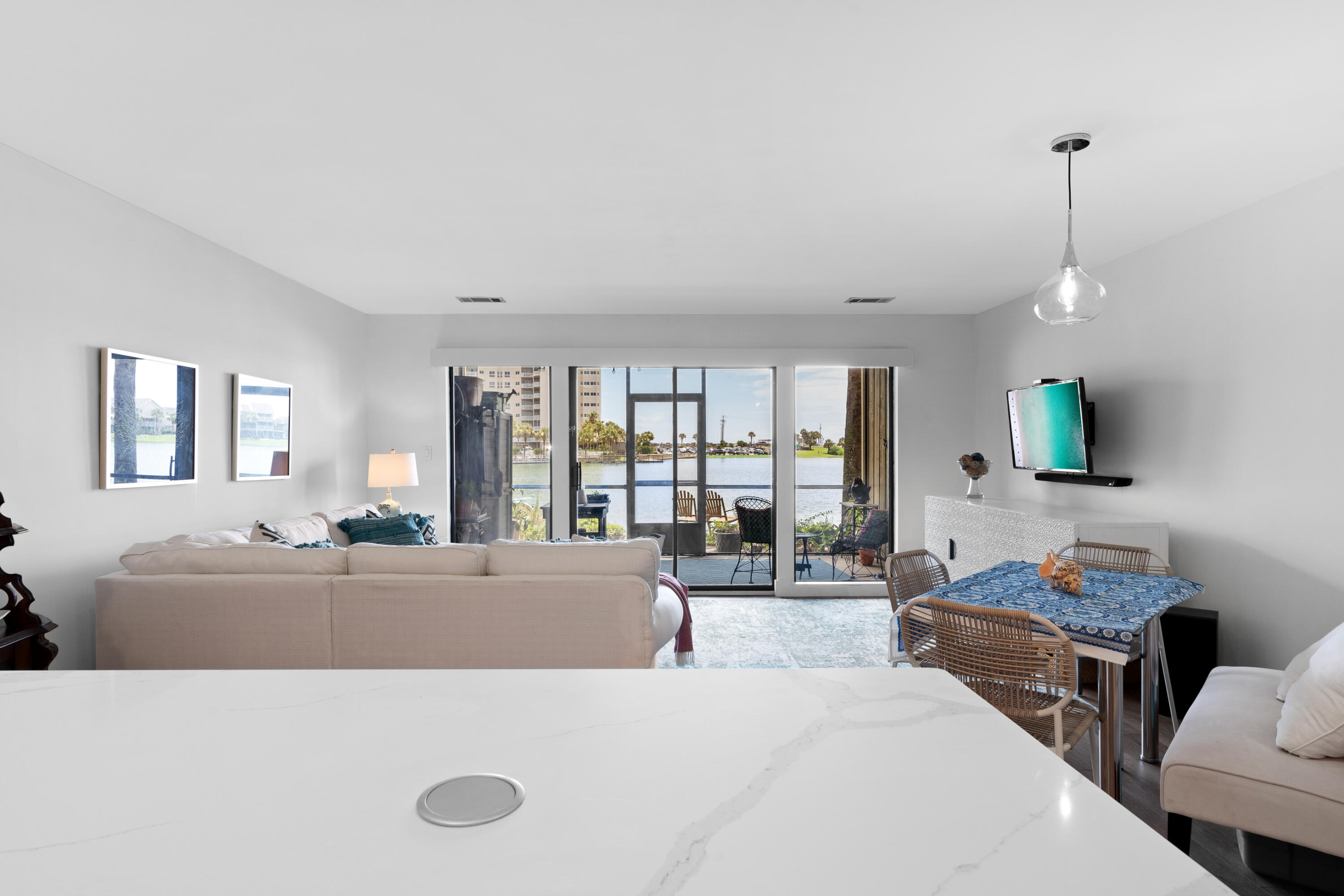 48 Stewart Lake Cove, Unit 194 Miramar Beach, FL 32550 - Photo 15 of 57 a living room with furniture and large windows