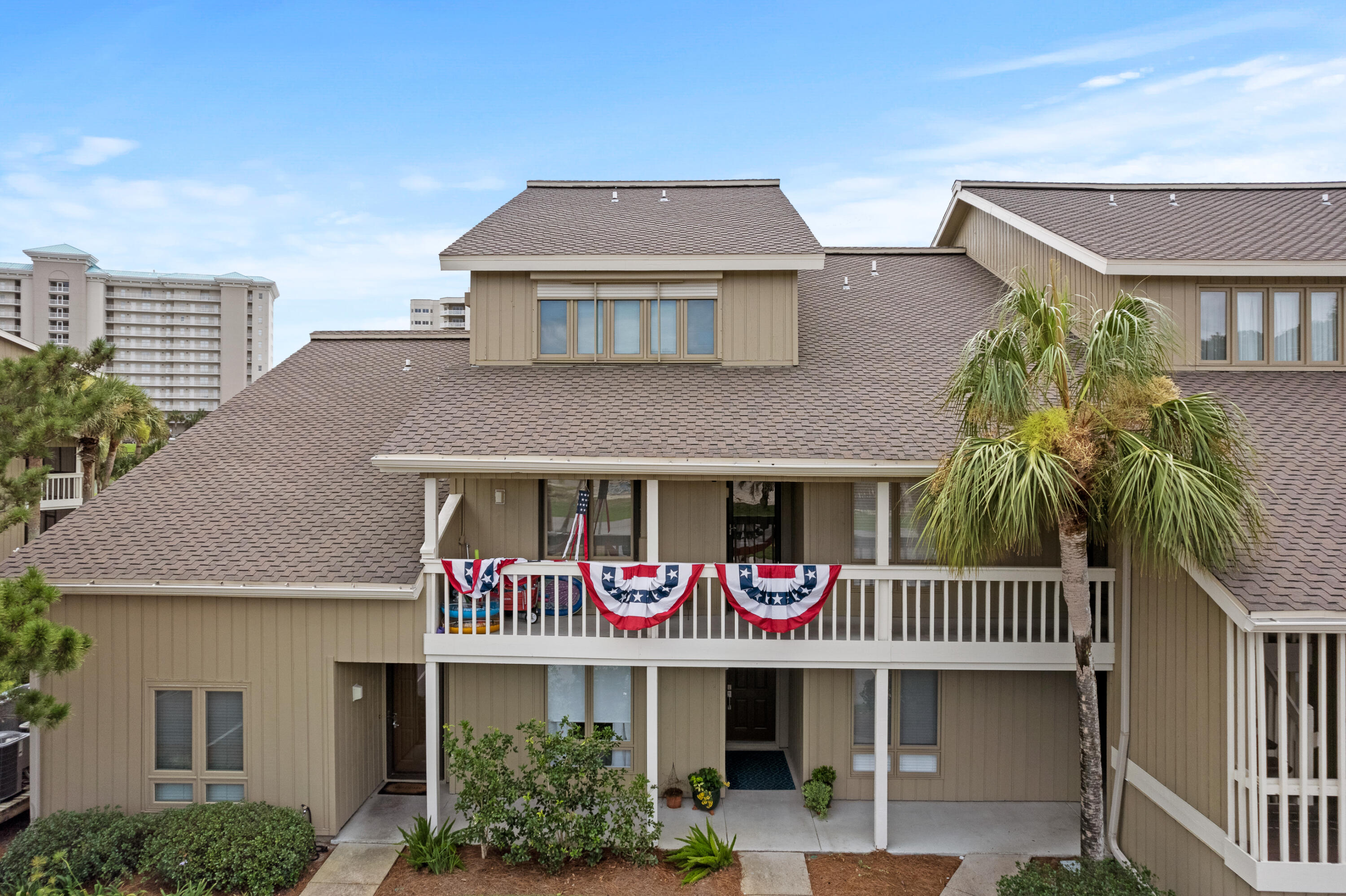 48 Stewart Lake Cove, Unit 194 Miramar Beach, FL 32550 - Photo 2 of 57 a front view of multi story residential apartment building with garage