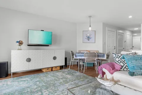 a bedroom with a bed and a table in it