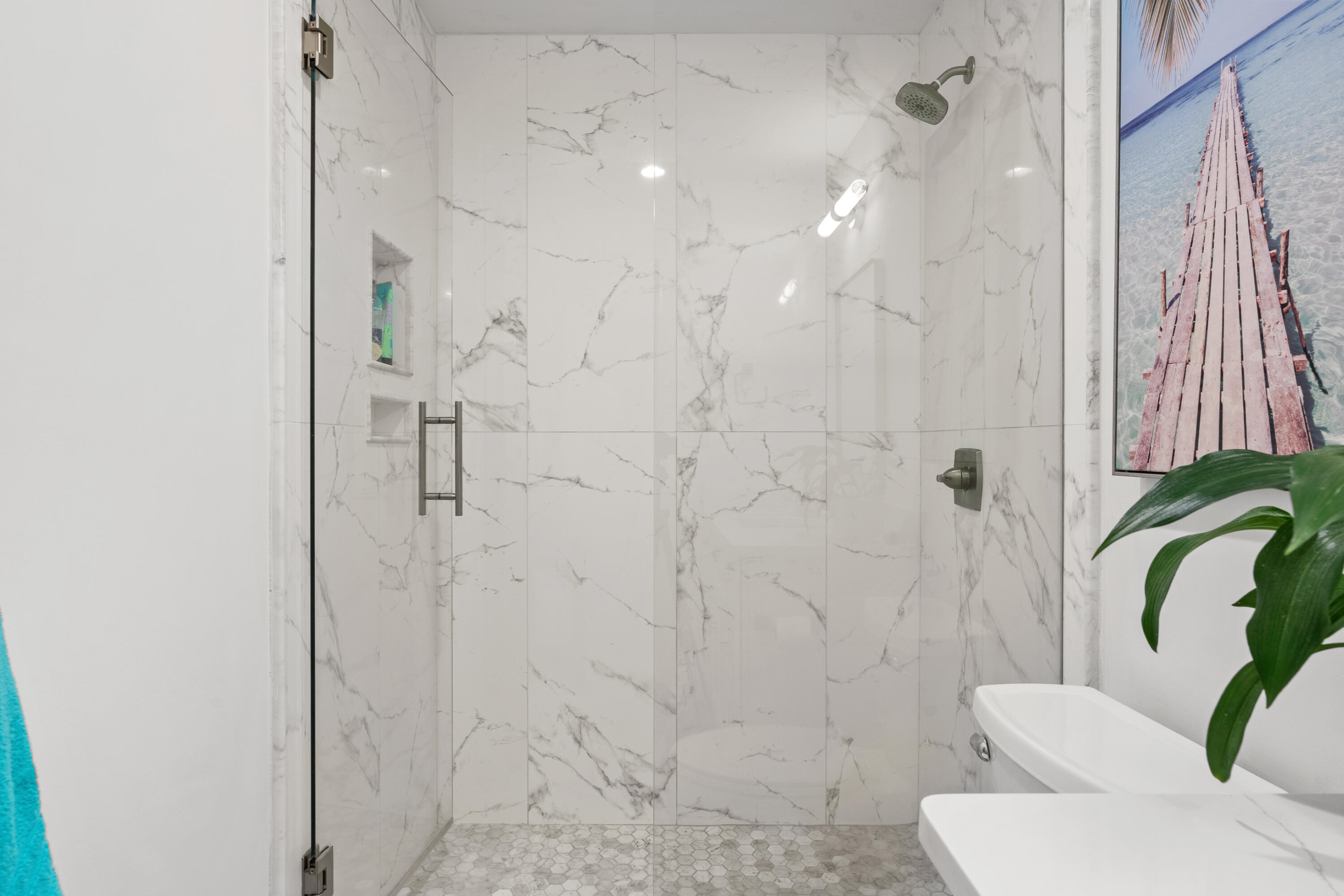 48 Stewart Lake Cove, Unit 194 Miramar Beach, FL 32550 - Photo 35 of 57 a bathroom with a bathtub and shower