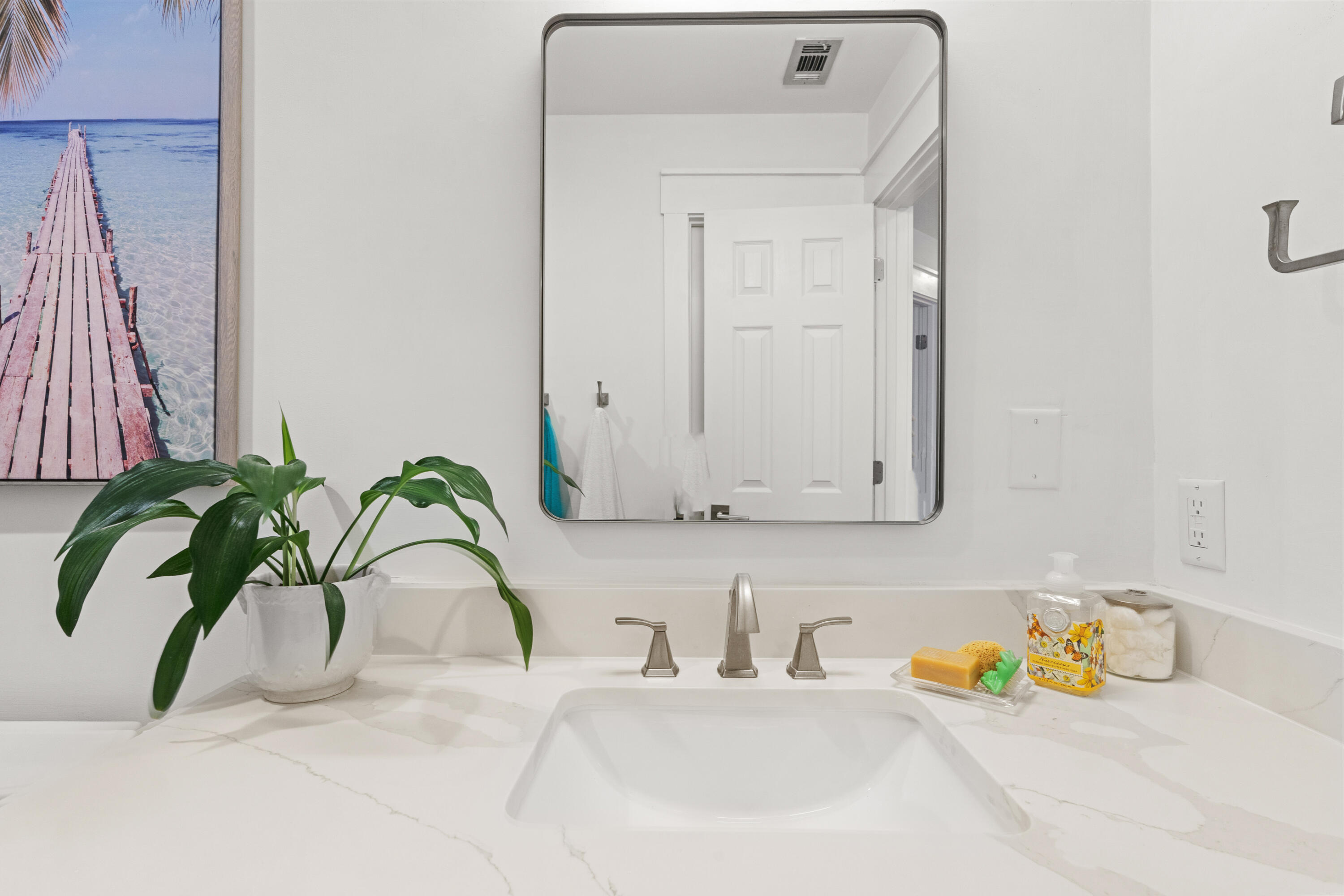 48 Stewart Lake Cove, Unit 194 Miramar Beach, FL 32550 - Photo 36 of 57 a bathroom with a granite countertop sink and a mirror