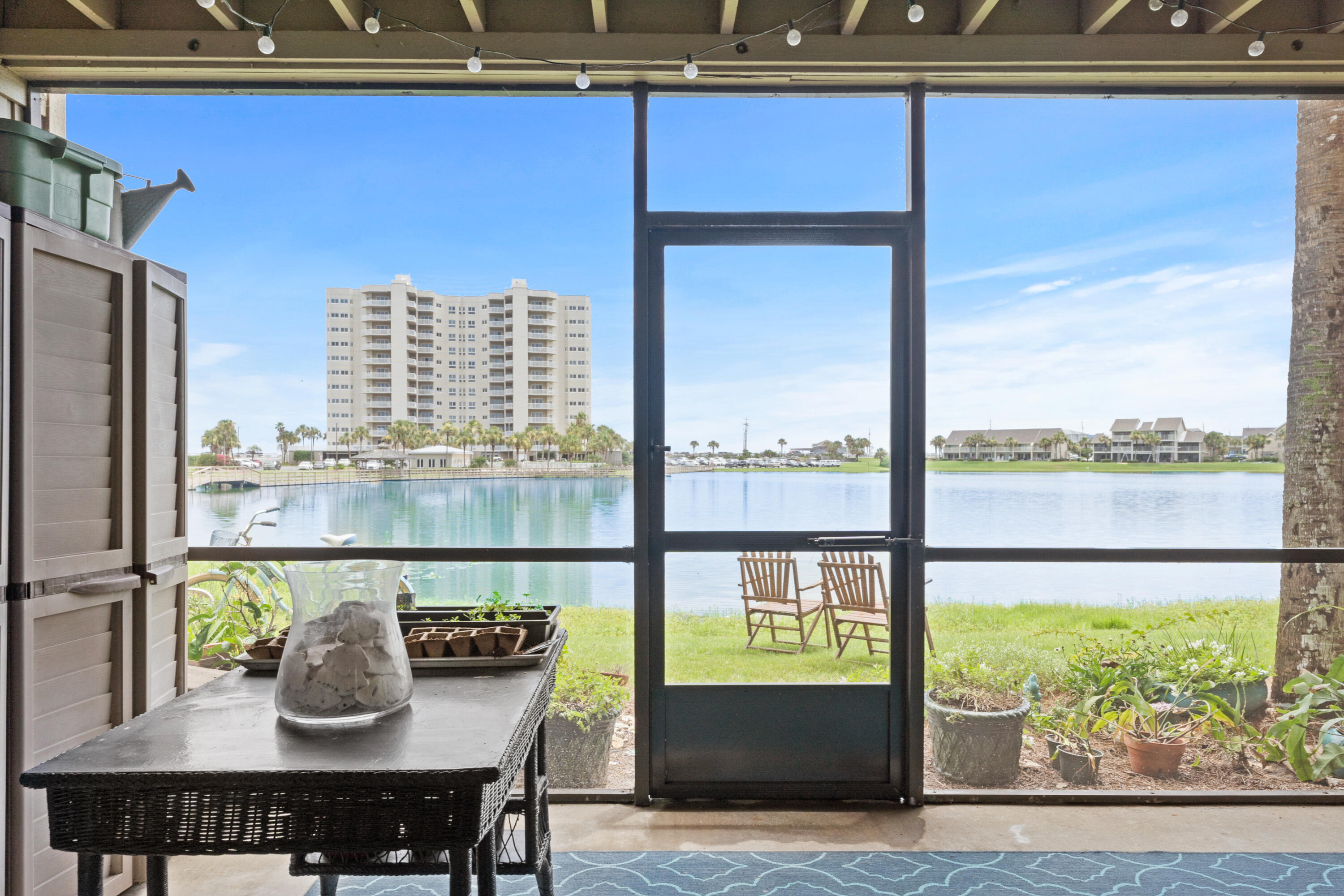 48 Stewart Lake Cove, Unit 194 Miramar Beach, FL 32550 - Photo 37 of 57 a view of a dining room with furniture window and outside view
