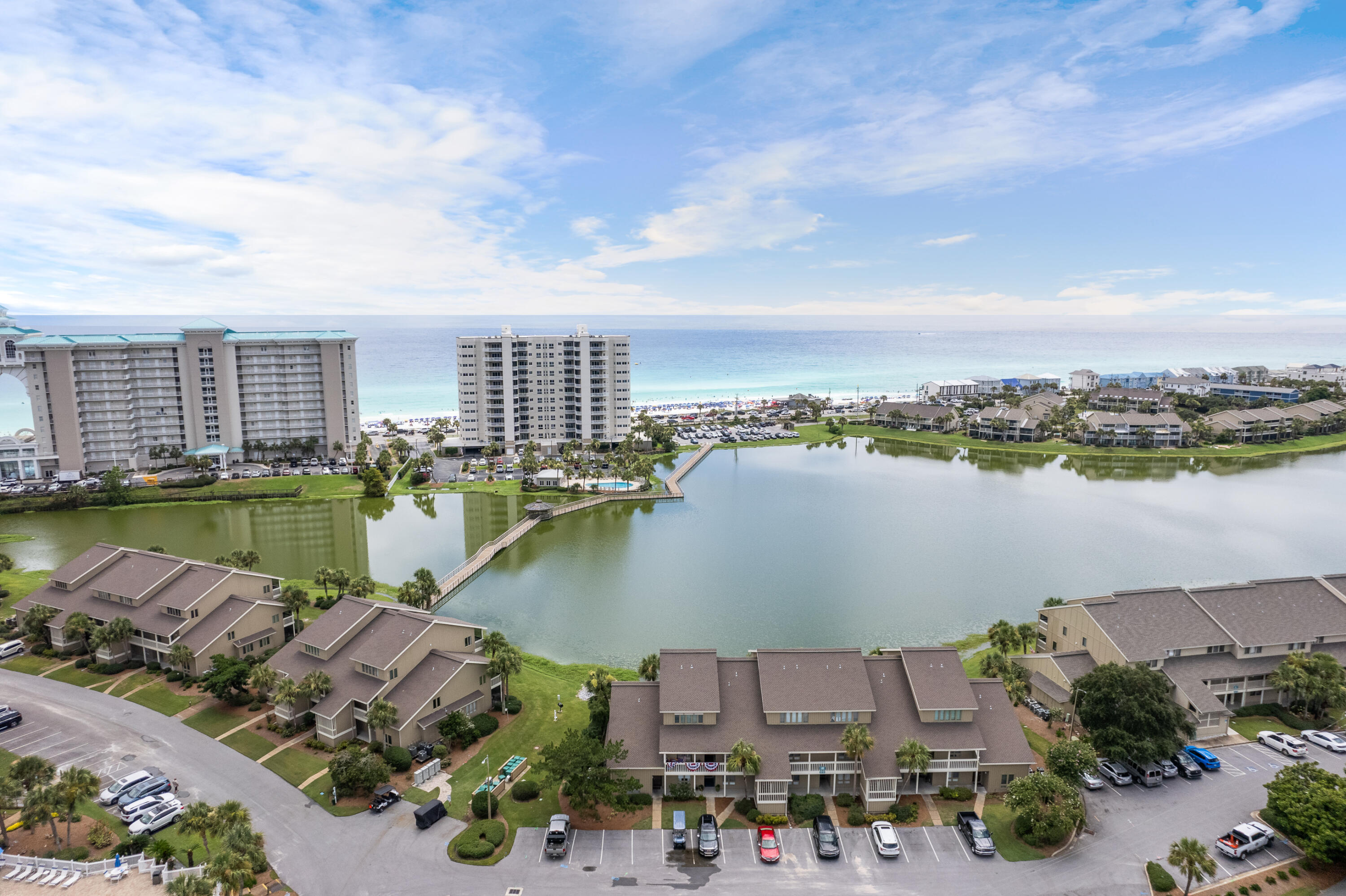48 Stewart Lake Cove, Unit 194 Miramar Beach, FL 32550 - Photo 43 of 57 a view of a lake with a city