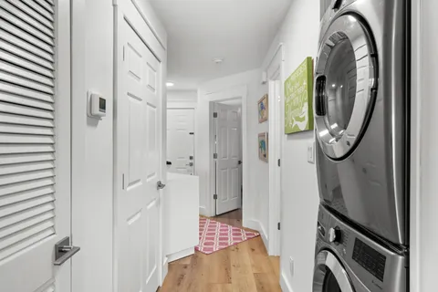 a bathroom with a shower and mirror