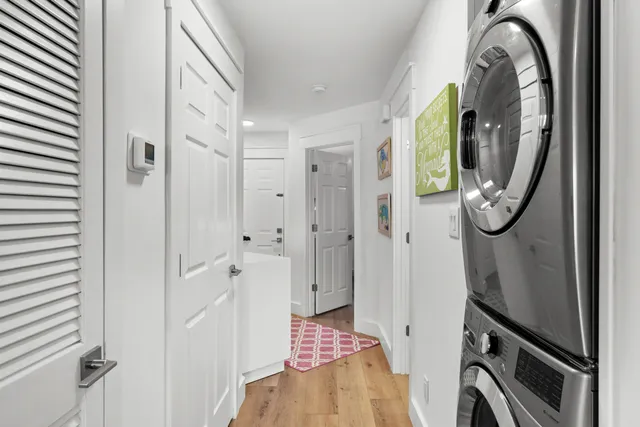 a bathroom with a shower and mirror