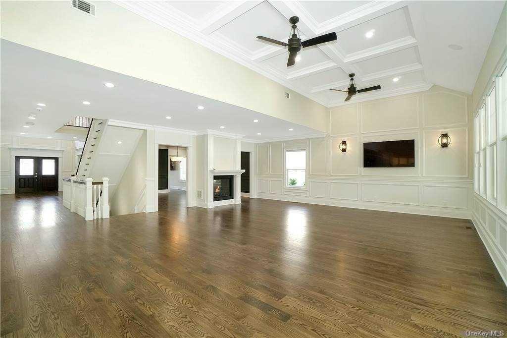 Lot 4 Wading River Road Manorville, NY 11949 - Photo 14 of 28 Unfurnished living room with beamed ceiling, ceiling fan, ornamental molding, and coffered ceiling. FOR MARKETING PURPOSES ONLY!