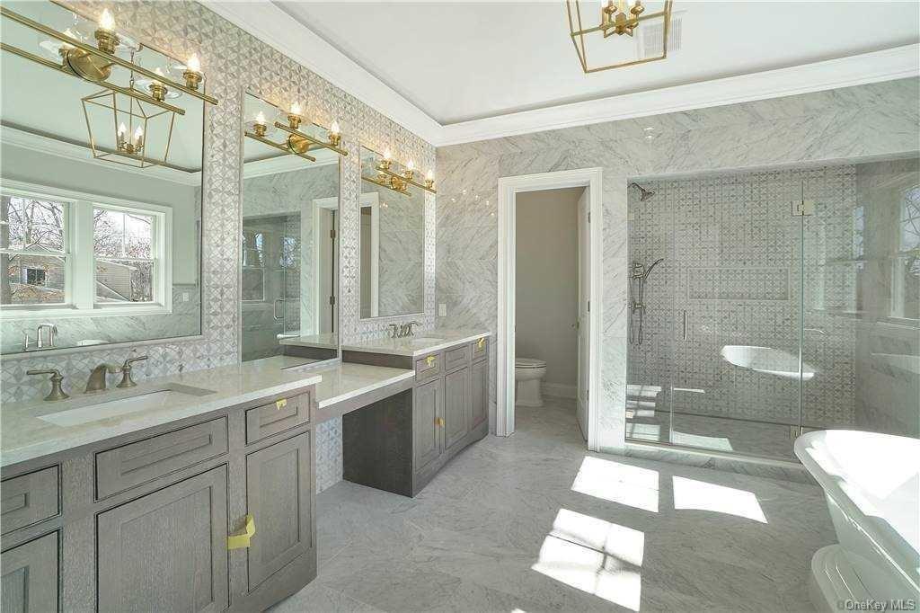Lot 4 Wading River Road Manorville, NY 11949 - Photo 20 of 28 Full bathroom featuring vanity, toilet, ornamental molding, and shower with separate bathtub. FOR MARKETING PURPOSES ONLY!