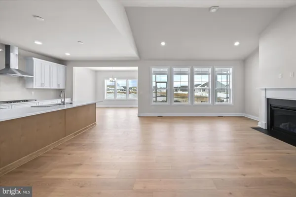 a large kitchen with a large window