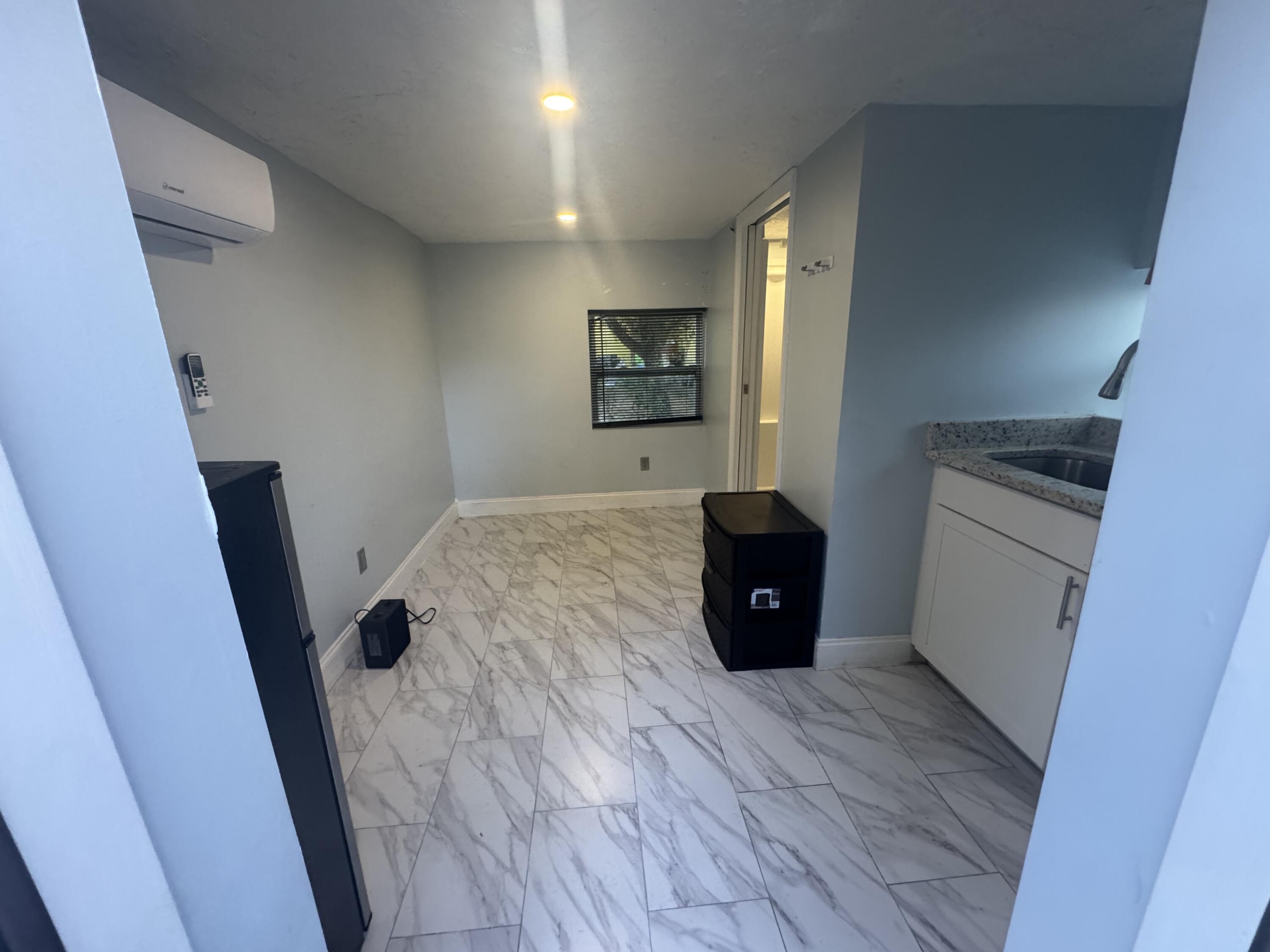 173 West 16th Street Riviera Beach, FL 33404 - Photo 1 of 9 Entry view