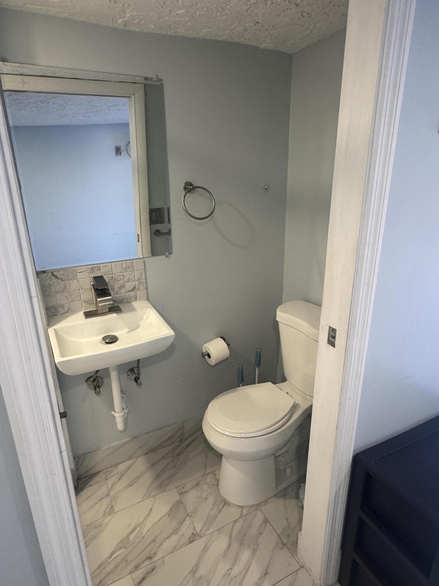 173 West 16th Street Riviera Beach, FL 33404 - Photo 5 of 9 IMG_0482