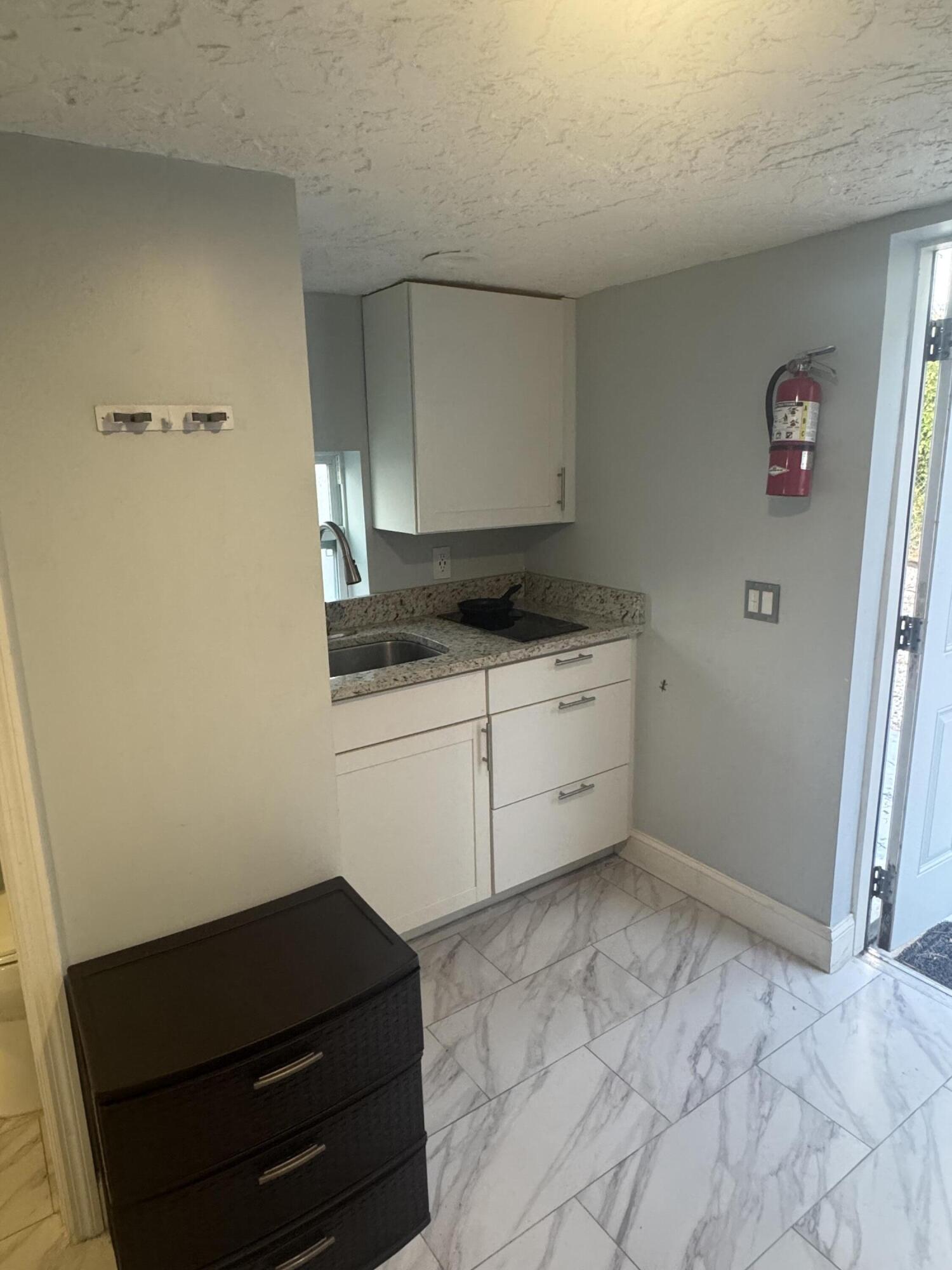 173 West 16th Street Riviera Beach, FL 33404 - Photo 9 of 9 IMG_0484