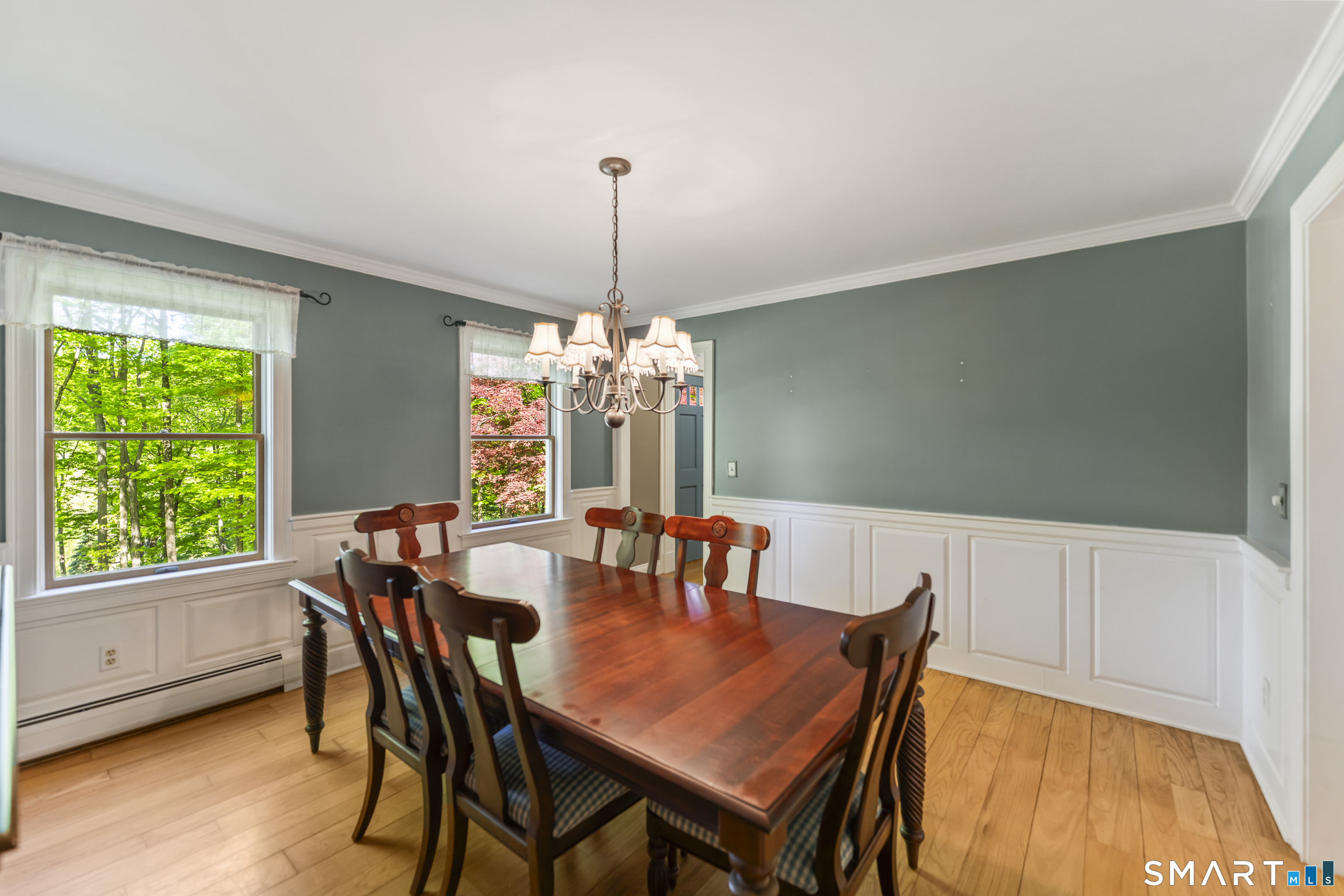 18 Gelding Hill Road Newtown, CT 06482 - Photo 12 of 40 a view of a dining room with furniture window and outside view