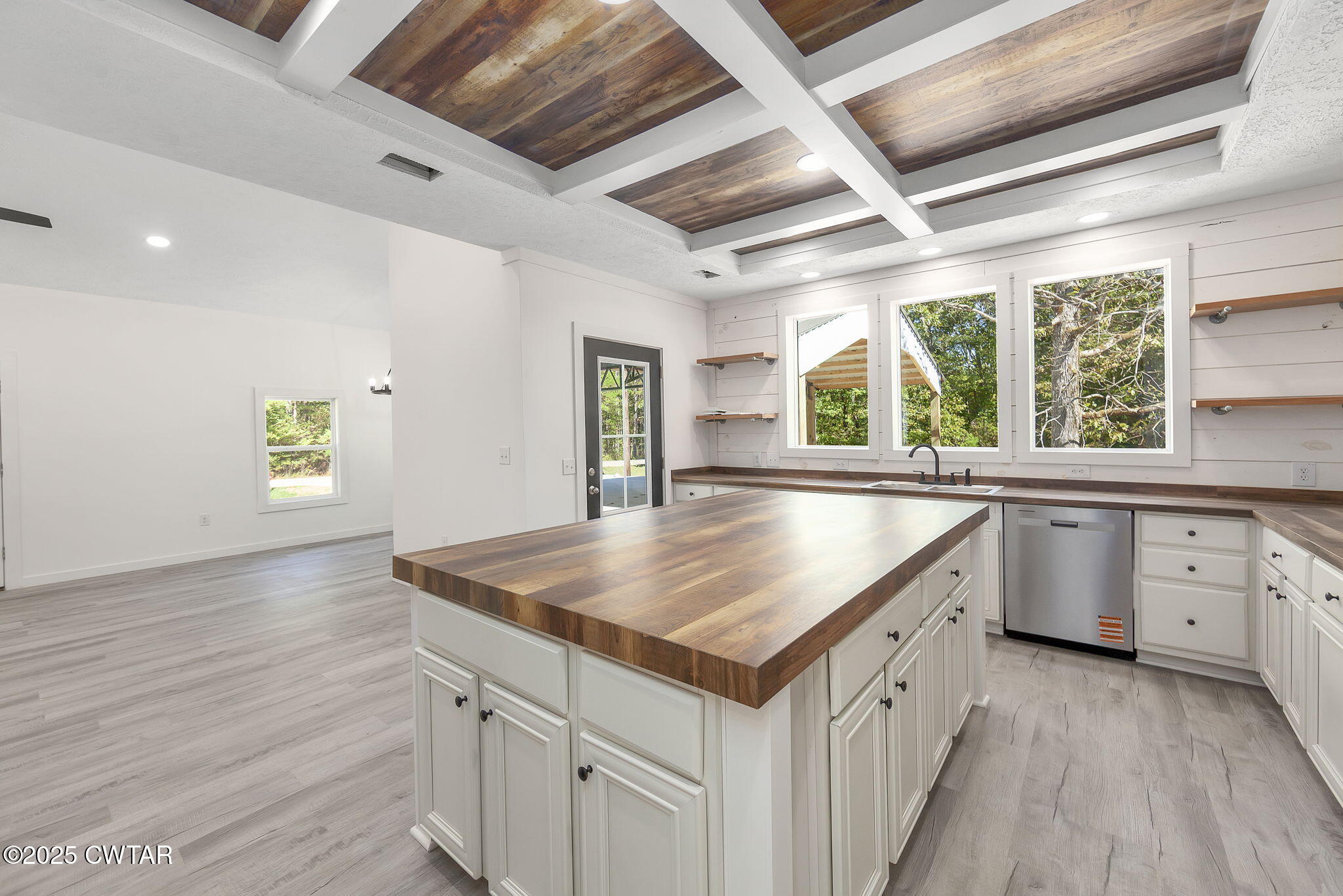 2885 Old Friendship Road Finger, TN 38334 - Photo 12 of 50 a kitchen with a stove a sink and a refrigerator