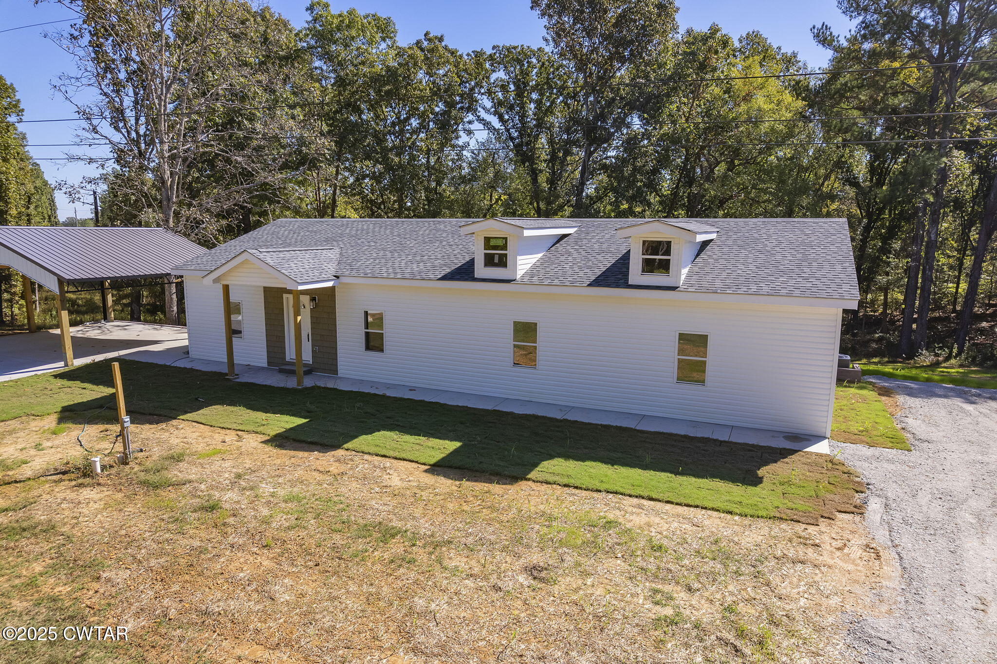 2885 Old Friendship Road Finger, TN 38334 - Photo 27 of 50 a front view of a house with a yard