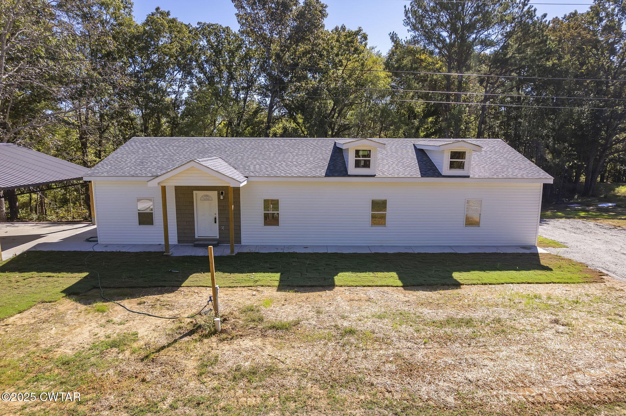 2885 Old Friendship Road Finger, TN 38334 - Photo 28 of 50 a front view of a house with a yard