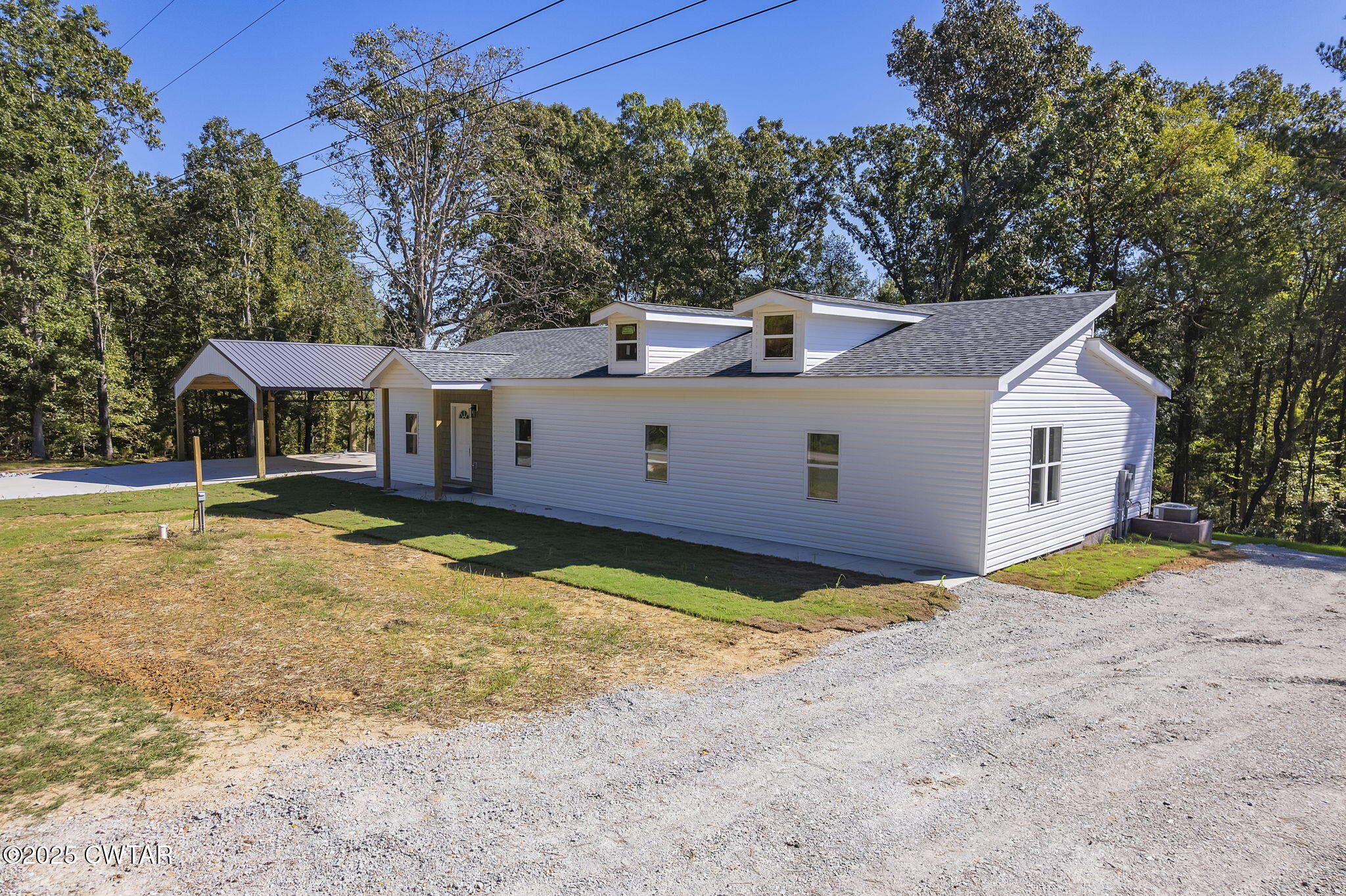 2885 Old Friendship Road Finger, TN 38334 - Photo 30 of 50 a view of a house with pool and a yard