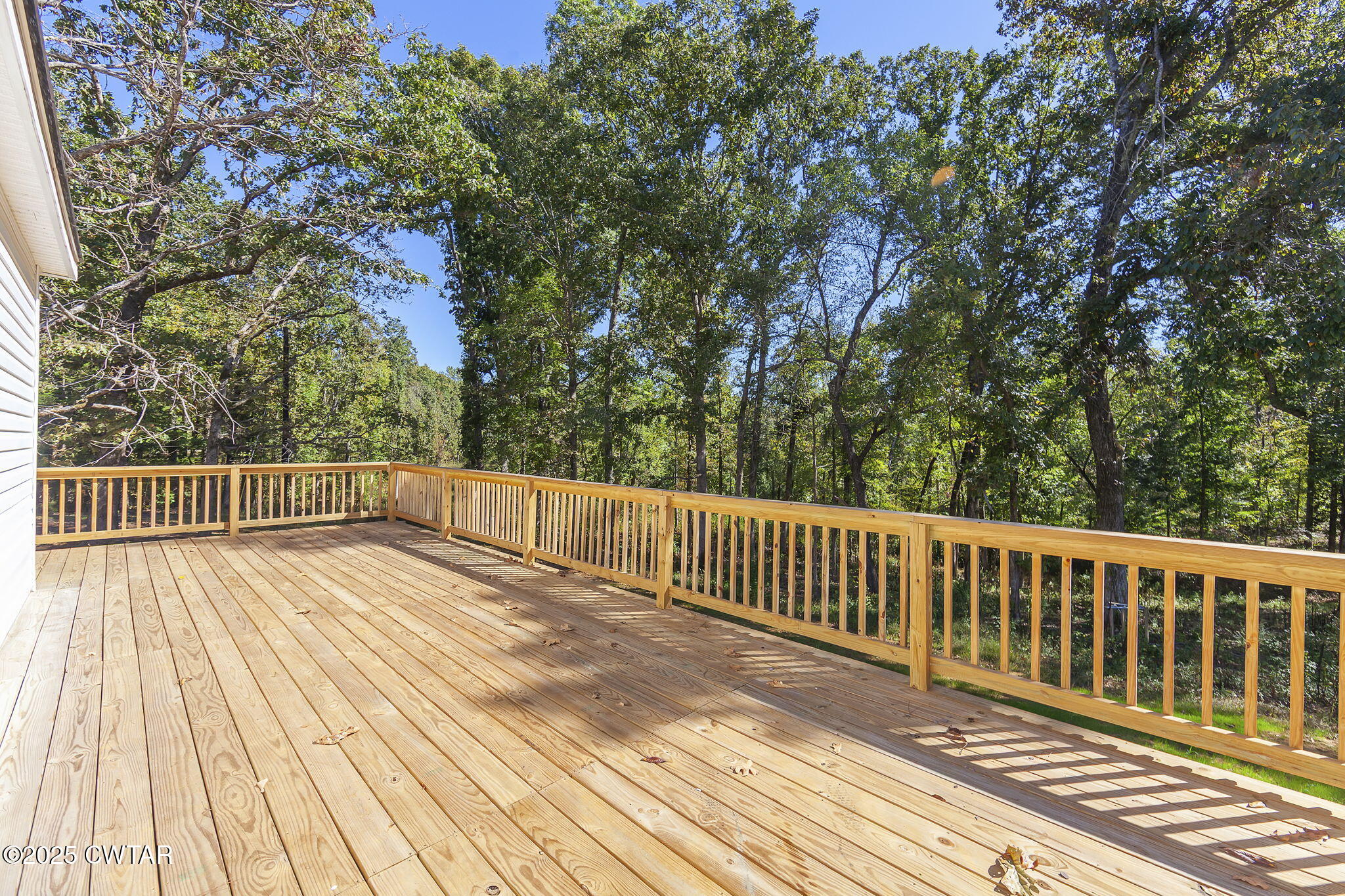 2885 Old Friendship Road Finger, TN 38334 - Photo 33 of 50 a view of balcony with wooden floor and fence