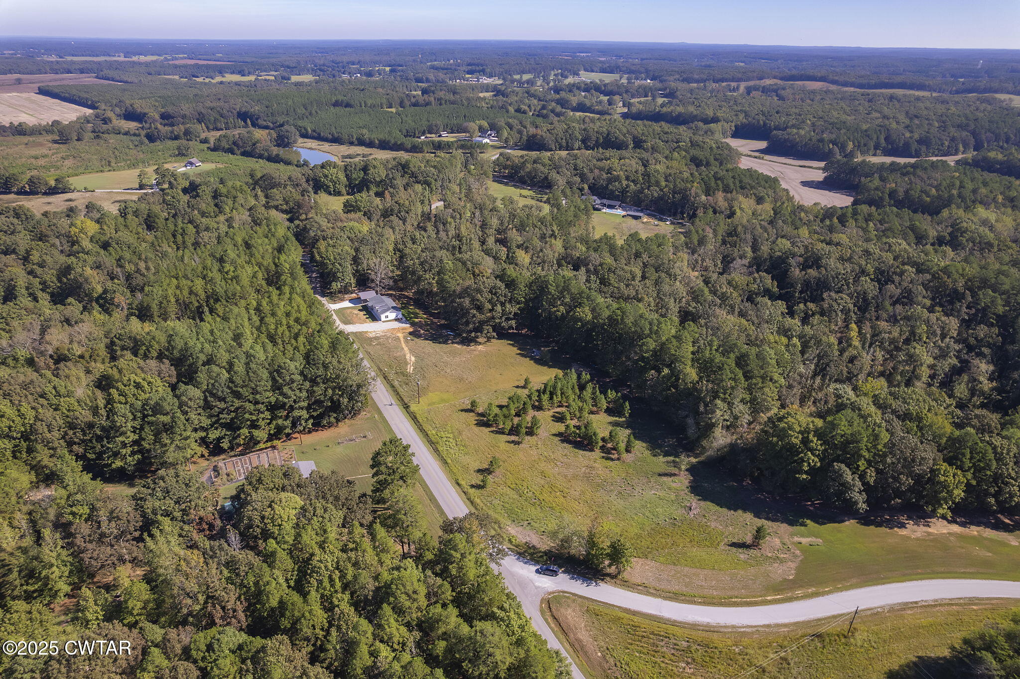 2885 Old Friendship Road Finger, TN 38334 - Photo 38 of 50 an aerial view of residential houses with outdoor space