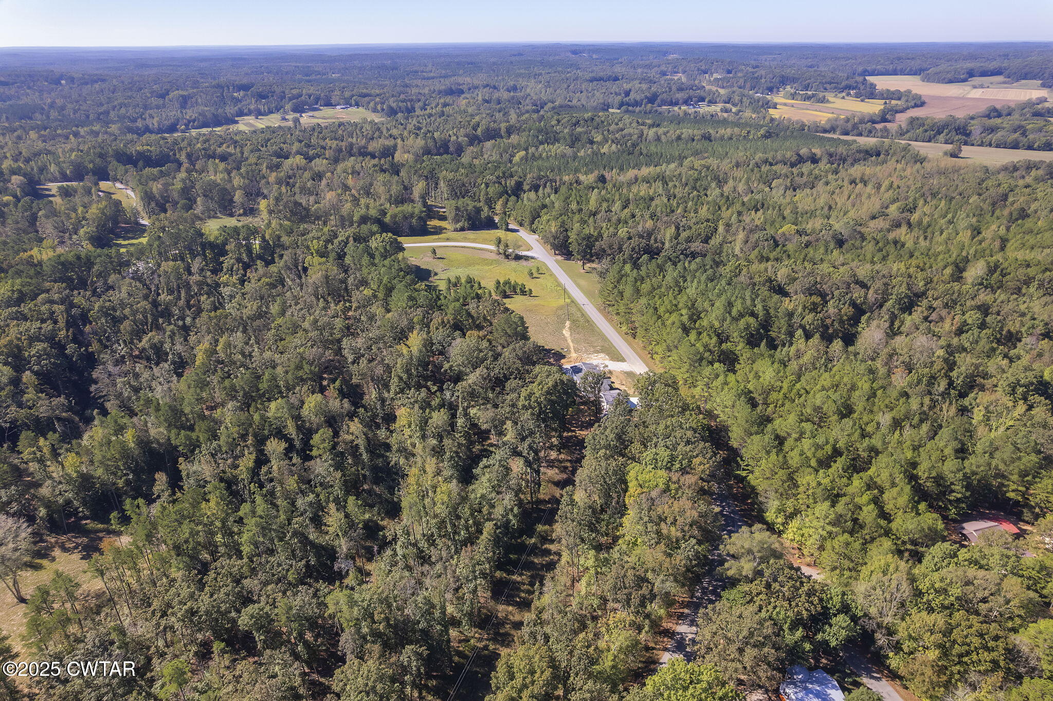 2885 Old Friendship Road Finger, TN 38334 - Photo 47 of 50 an aerial view of house with yard and mountain view in back