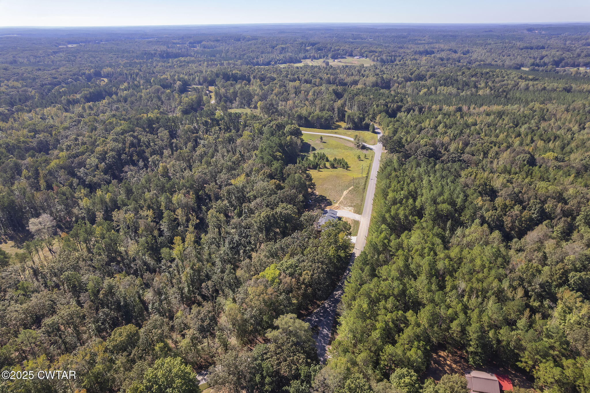 2885 Old Friendship Road Finger, TN 38334 - Photo 48 of 50 an aerial view of a house with a garden