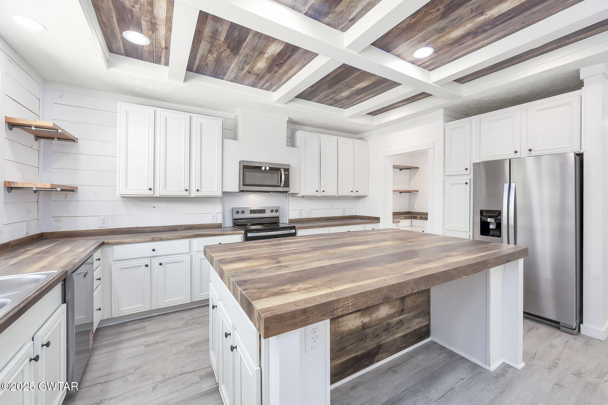 2885 Old Friendship Road Finger, TN 38334 - Photo 9 of 50 a kitchen with appliances a sink and cabinets