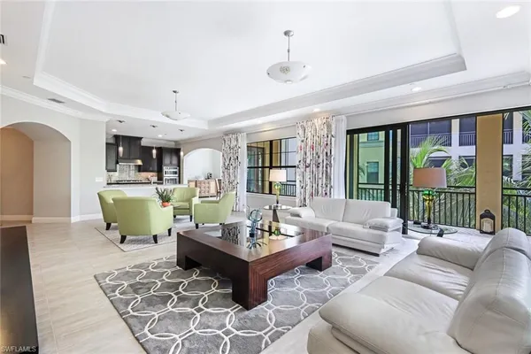 a living room with furniture and a table