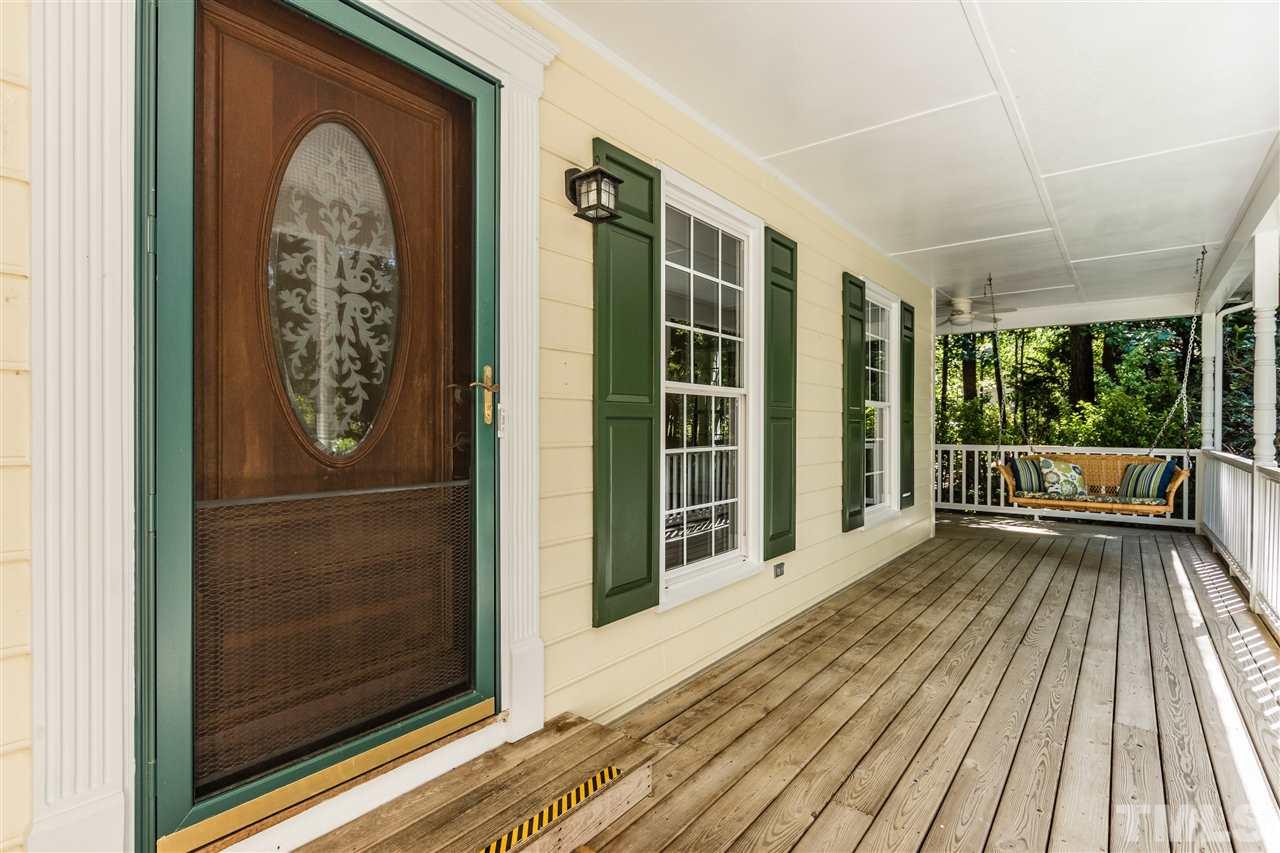 5606 Red Coach Road Durham, NC 27712 - Photo 2 of 25 a view of a house with a balcony