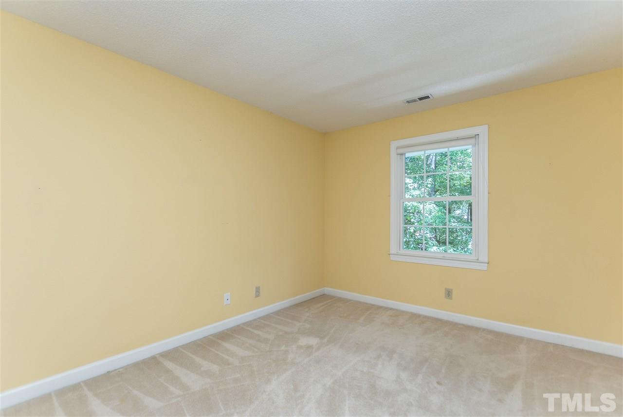 5606 Red Coach Road Durham, NC 27712 - Photo 19 of 25 an empty room with a window