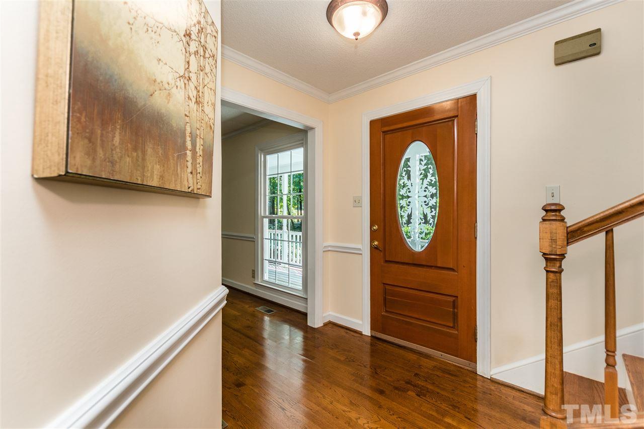5606 Red Coach Road Durham, NC 27712 - Photo 3 of 25 a view of entryway with wooden floor