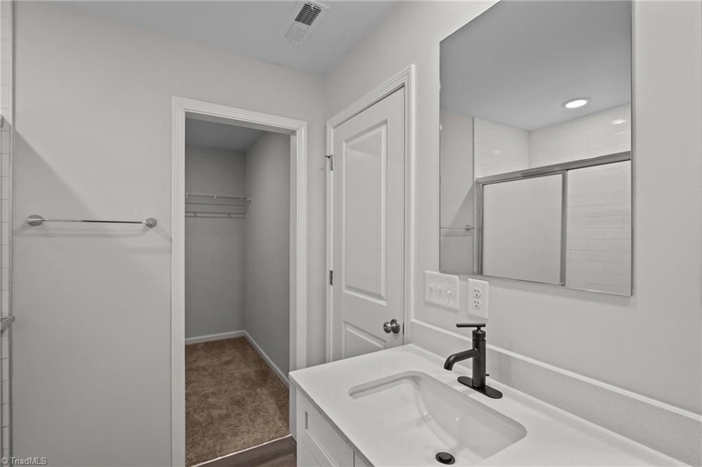 409 Pinnacle Drive Randleman, NC 27317 - Photo 13 of 25 primary bath/ walk in closet