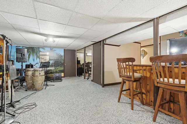 a view of a livingroom with furniture and a table