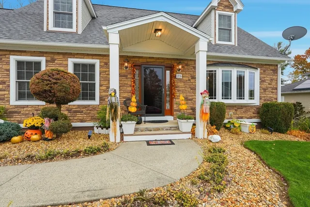 front view of a house with a yard