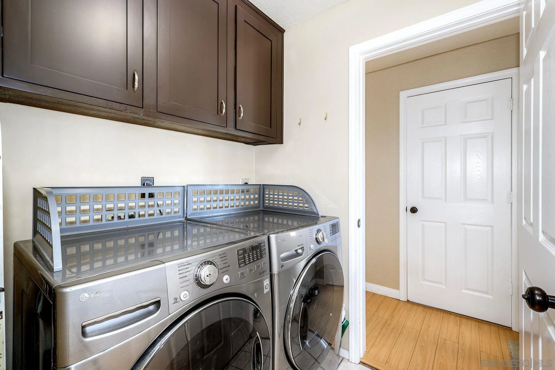 13976 Country Creek Road Poway, CA 92064 - Photo 27 of 40 a utility room with dryer and washer