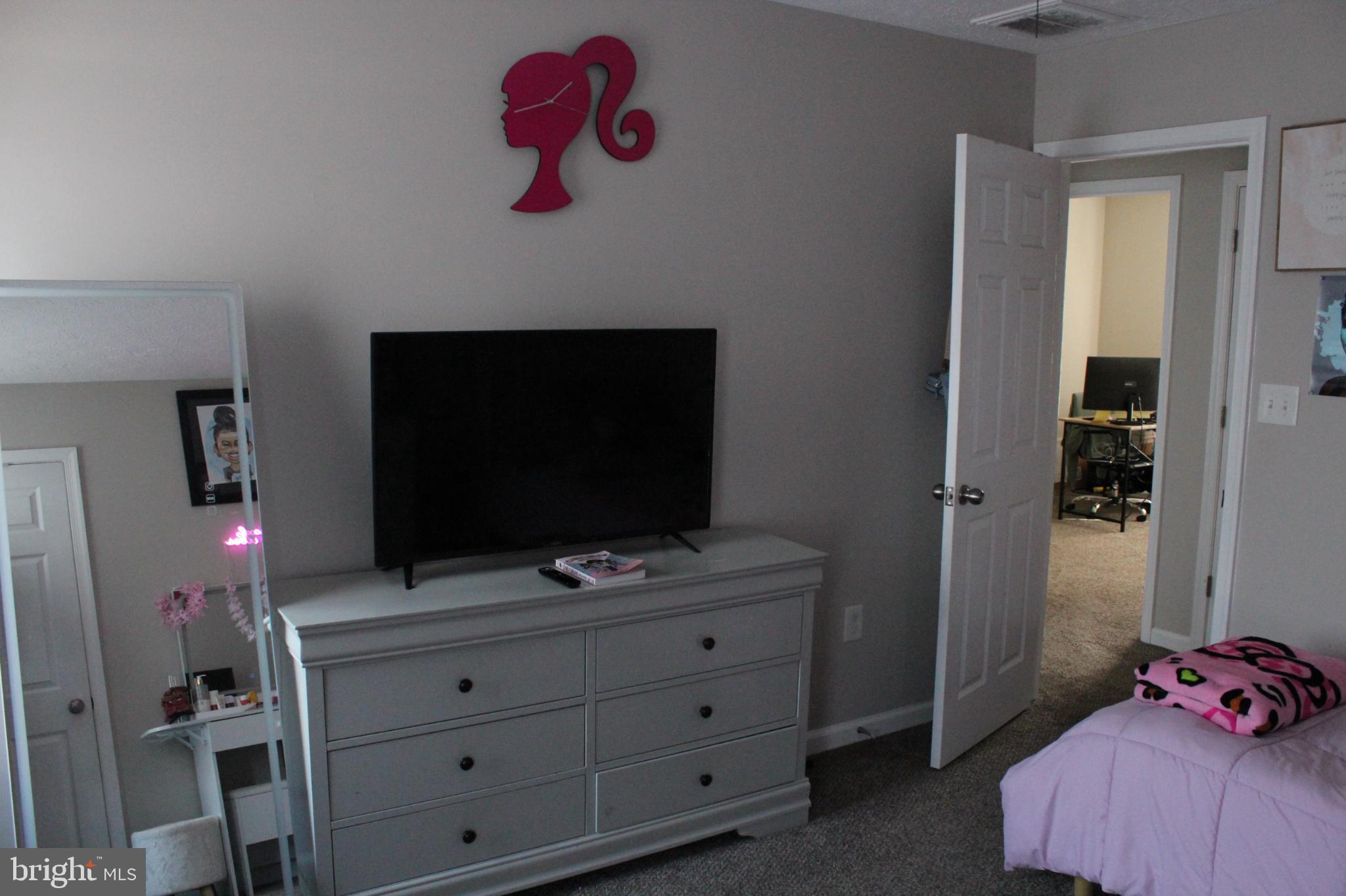 107 Fancy Court Stephens City, VA 22655 - Photo 19 of 36 a living room with furniture and flat screen tv