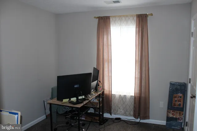 a bathroom with a toilet and a sink