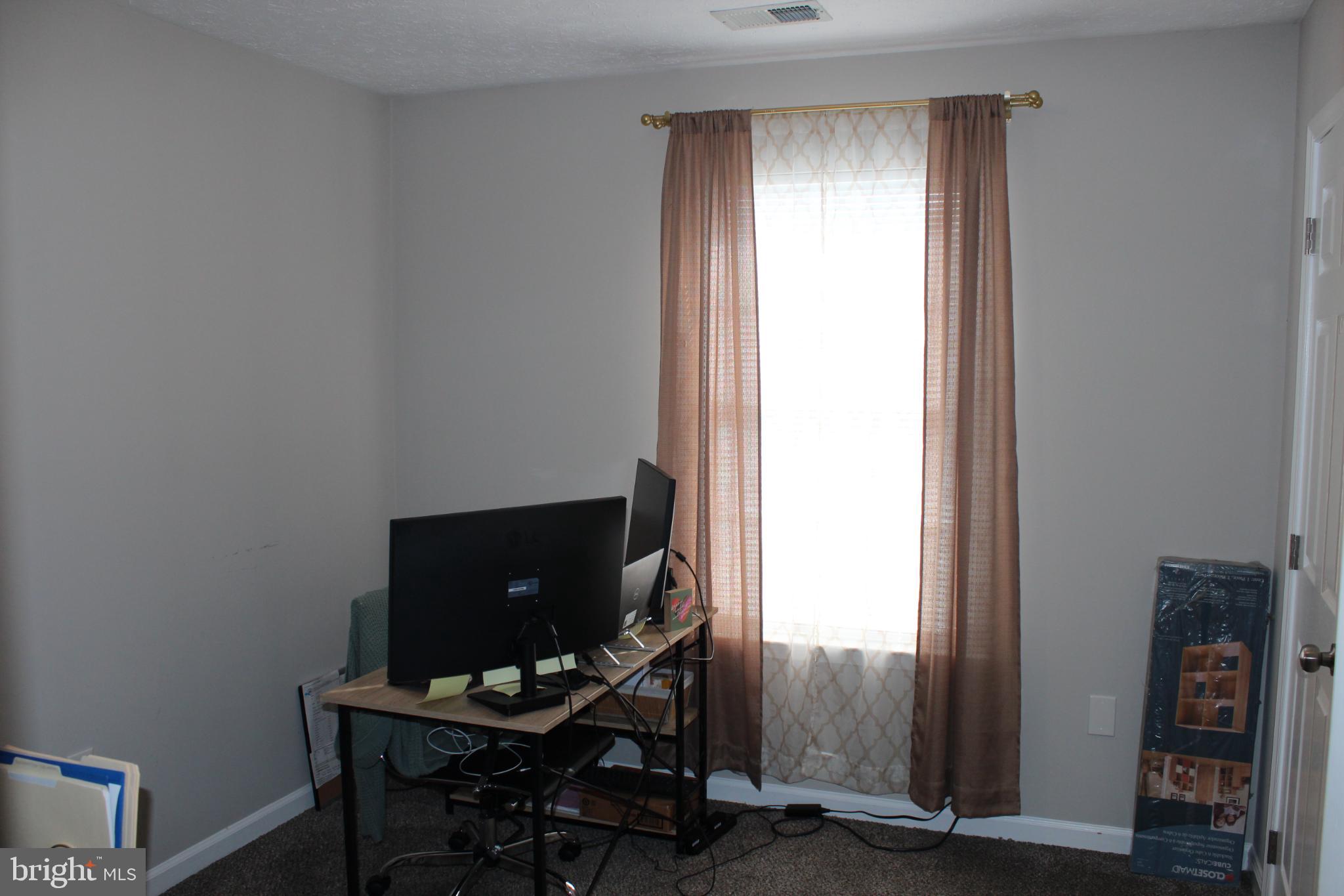 107 Fancy Court Stephens City, VA 22655 - Photo 24 of 36 a view of a workspace with furniture and a window